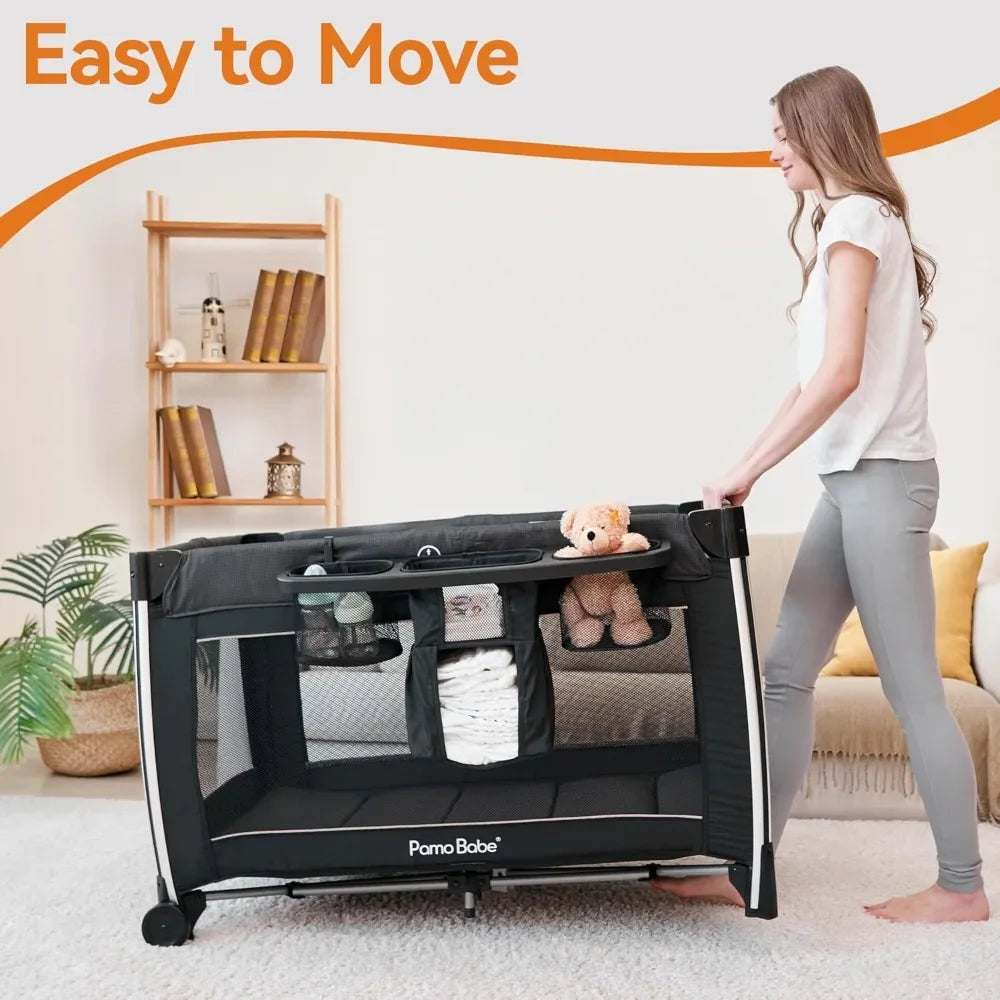 Pamo Babe 4 in 1 Portable Baby Crib Deluxe Nursery Center, Foldable Travel Playard with Bassinet, Mattress, Changing Table for N